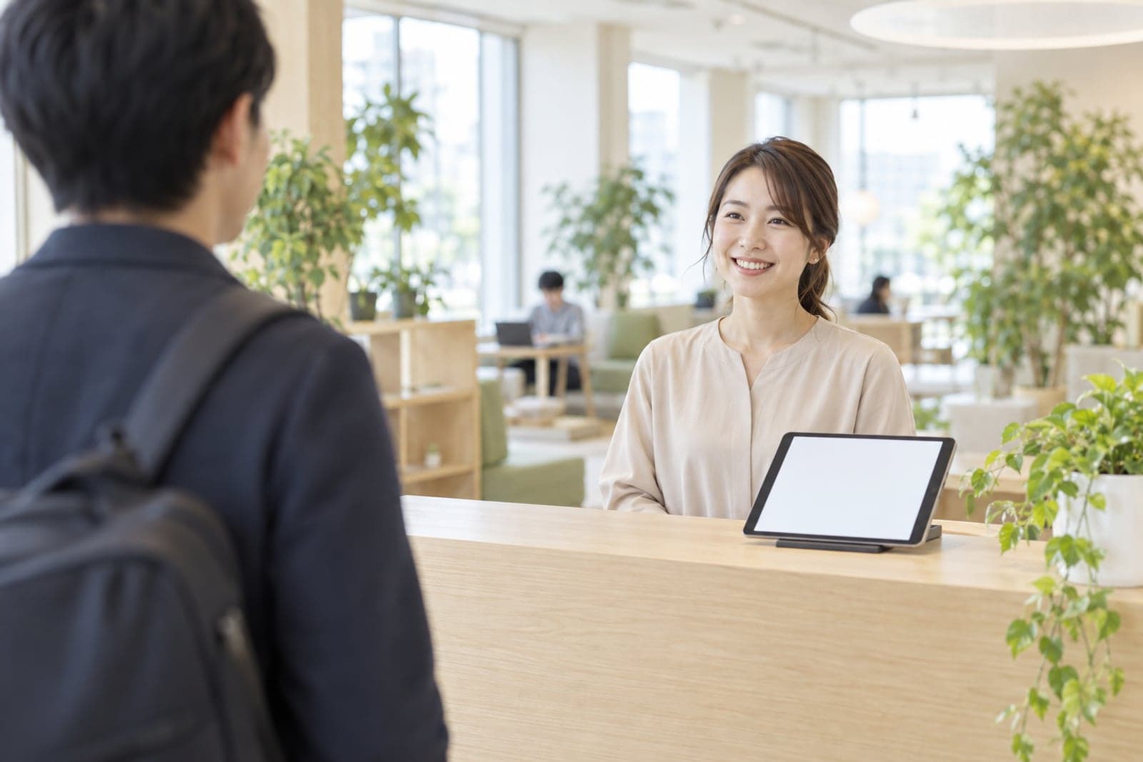 来訪者の受付と、担当者への通知